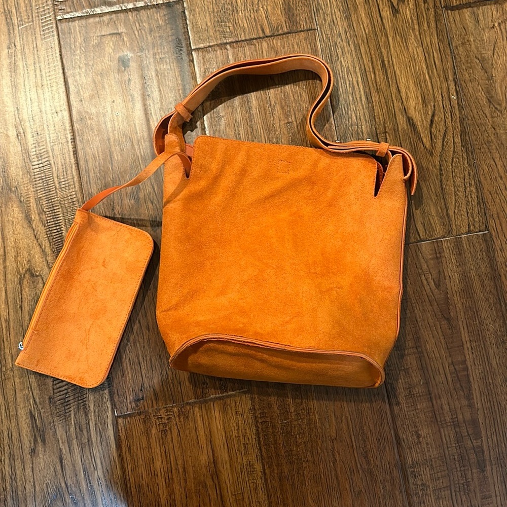 Small suede hand bag with wallet attached!